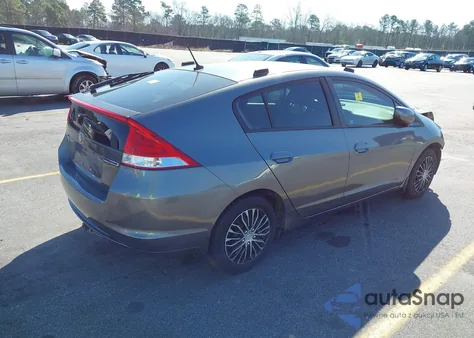 2011 Honda Insight from USA, damaged, VIN JHMZE2H3XBS005408